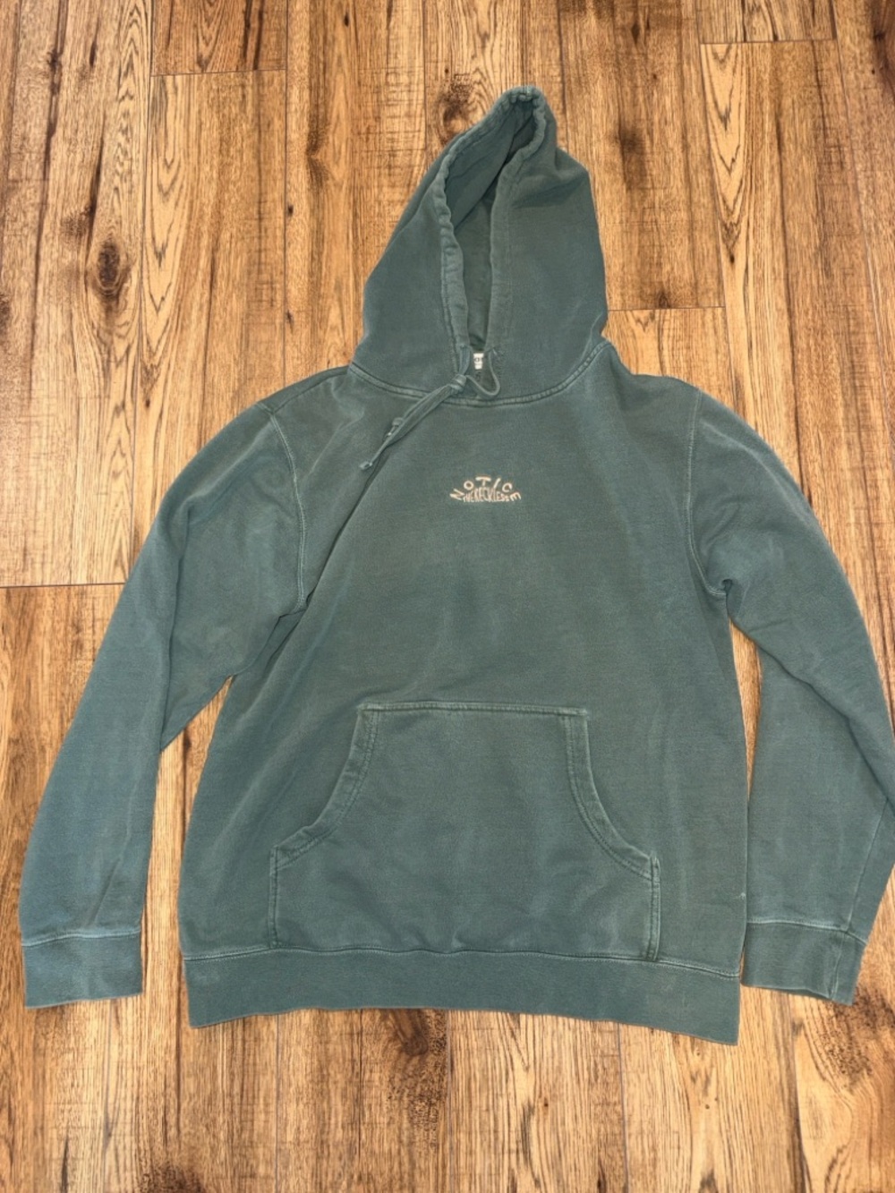 Notice the Reckless green hoodie